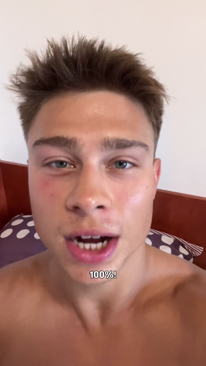 Alex talking straight to camera from bed, caption reading: 100 percent